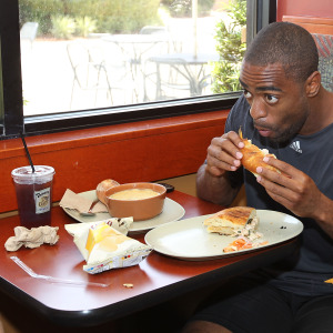 Olympic sprinter Tyson Gay of the United States of America eats lunch at Panera Bread restaurant