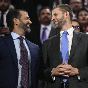 Sons of U.S. President Donald Trump, Eric Trump and Donald Trump Jr., attend the first day of the 2024 Republican National Convention at the Fiserv Forum in Milwaukee, Wisconsin.