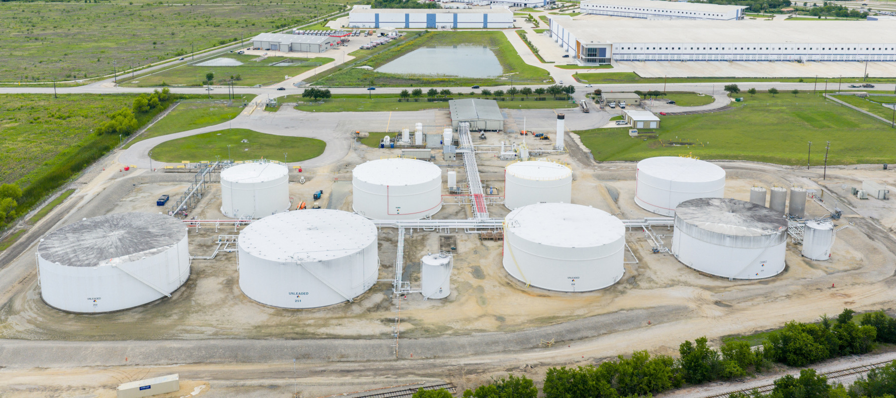 In an aerial view, oil storage tanks are seen at the Sunoco LP Fuel Supply Terminal in Austin, Texas