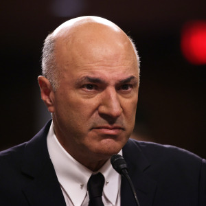 Investor and television personality Kevin O’Leary testifies during a hearing, looking very angry.