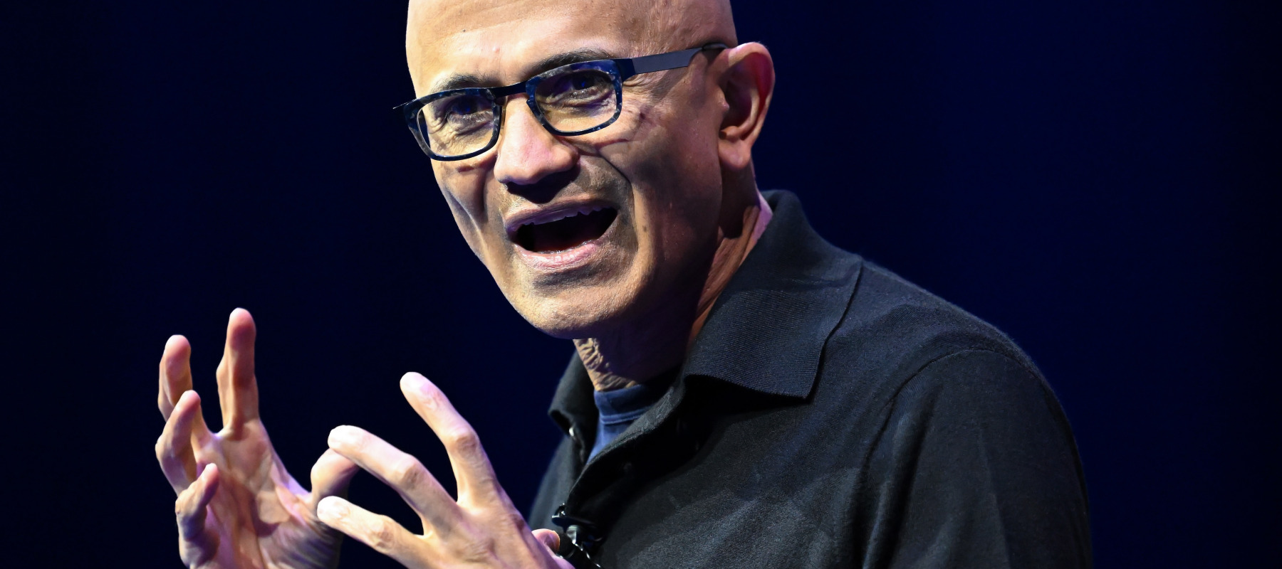 Satya Nadella, CEO of Microsoft, speaks on stage during the Microsoft AI Tour in Munich.