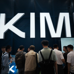 People visit the booth of Kimi, an LLM developed by the Chinese startup Moonshot, during the World AI Conference in Shanghai.
