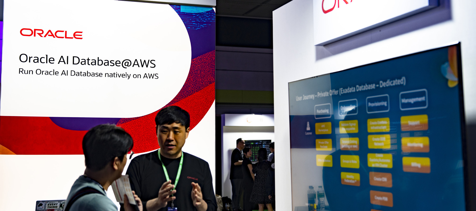 Attendees explore the Oracle exhibition booth during the AWS Summit Seoul 2026.