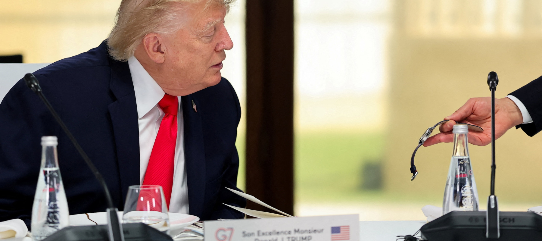 Trump looking at watch