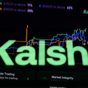 A photo of the Kalshi logo over a trading graphic