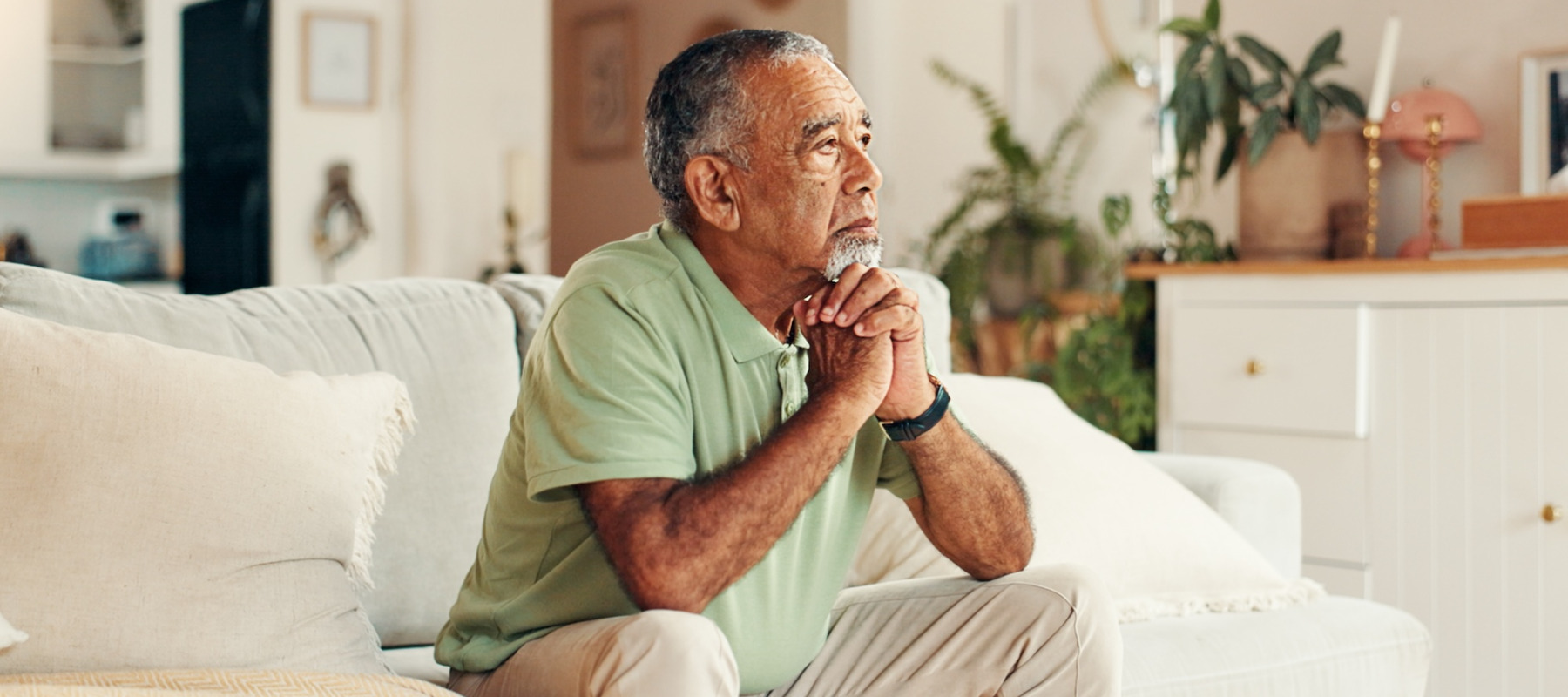 A photo of a man thinking