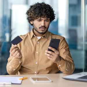 Stressed customer receiving bank alert.
