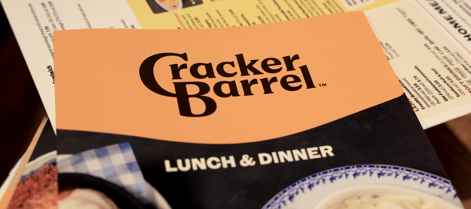 A new Cracker Barrel menu with the company's new logo.