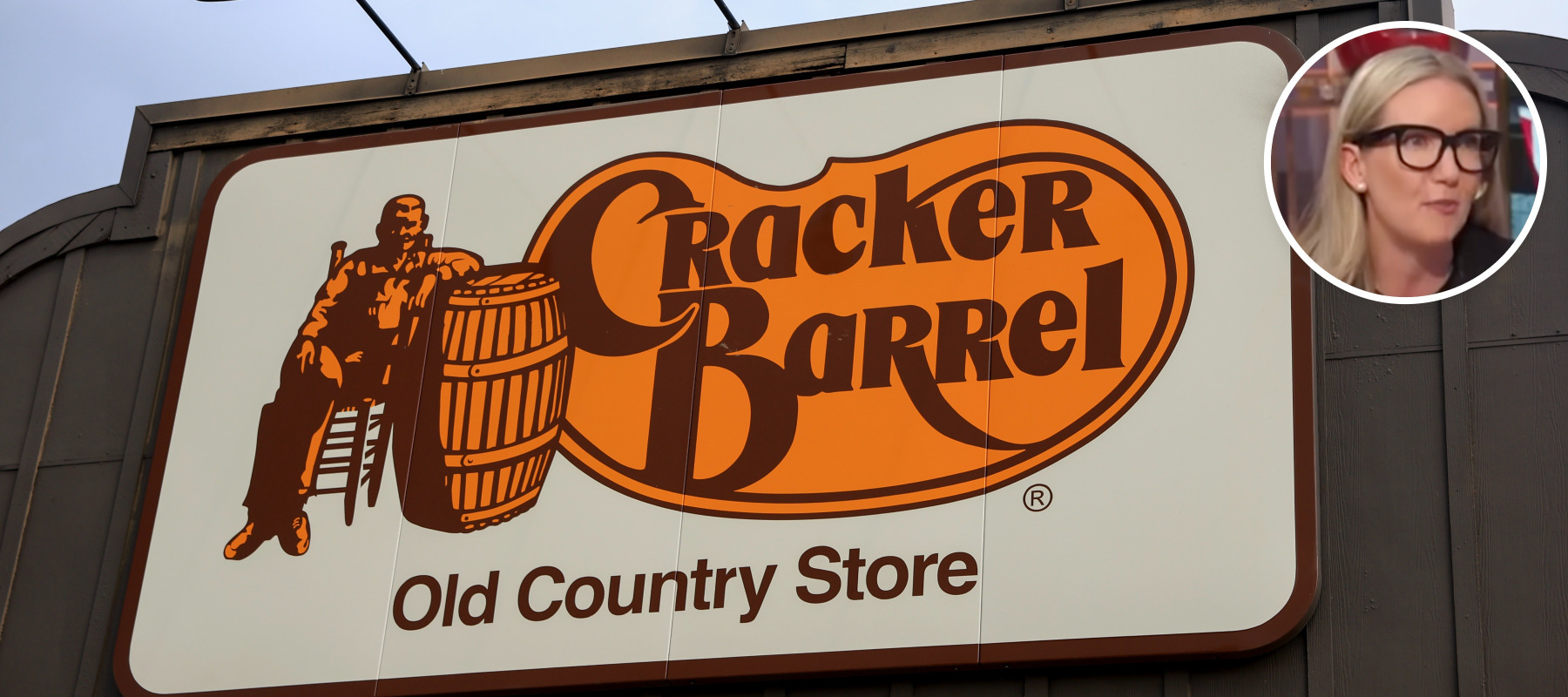 A Cracker Barrel sign with Julie Masino's image.