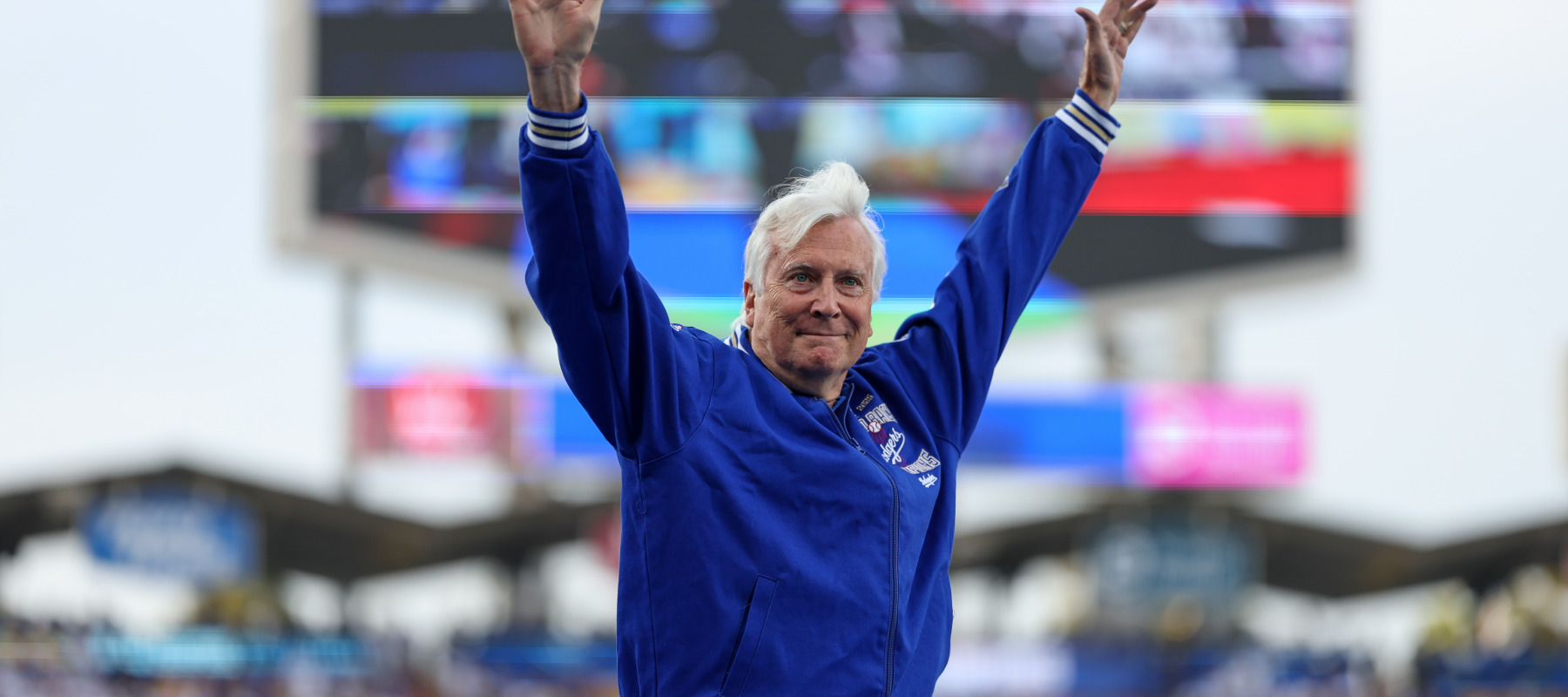 LA Dodgers owner and CEO Mark Walter waving to the crowd.