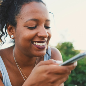girl looking at phone