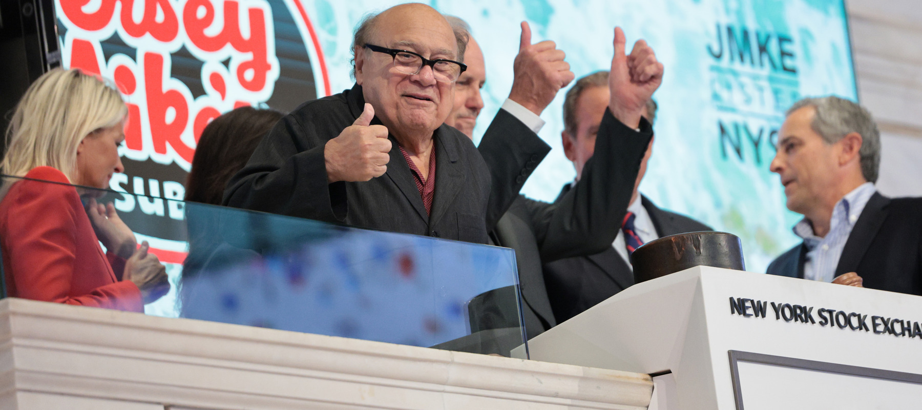 Actor Danny DeVito prepares to ring the opening bell at the New York Stock Exchange to celebrate Jersey Mike's Sub Initial Public Offering.