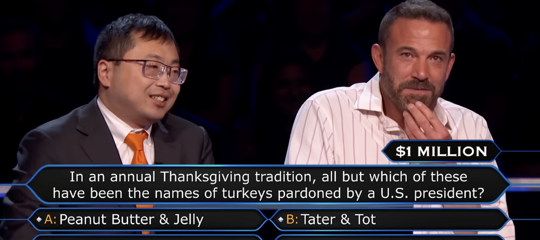 A photo of Jamie Ding and Ben Affleck on Who Wants to Be a Millionaire