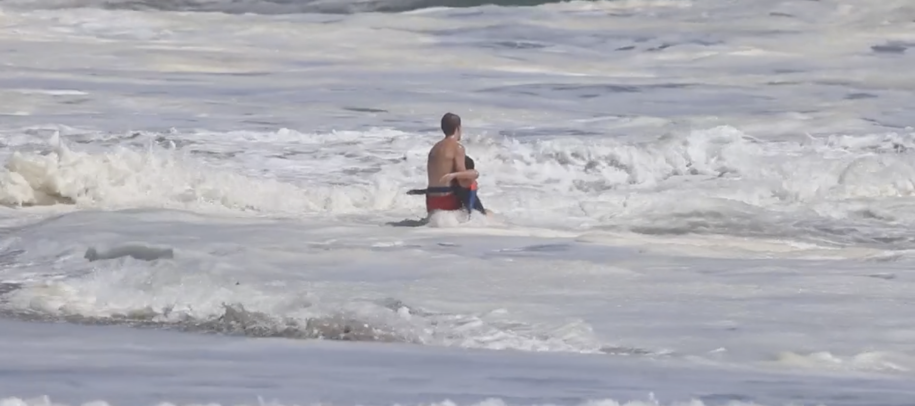 Screenshot of video showing 16-year-old Ryder Williams saving a young boy from drowning.