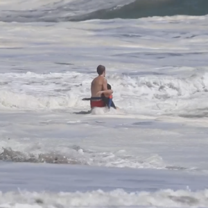 Screenshot of video showing 16-year-old Ryder Williams saving a young boy from drowning.
