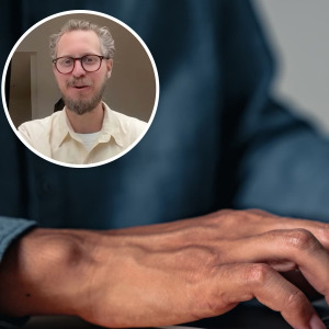 A photo of a man typing on a laptop featuring Ben Broca