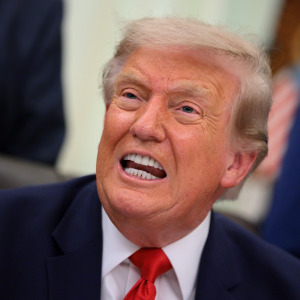 U.S. President Donald Trump speaks during an announcement to renovate Washington Dulles International Airport, in the Oval Office of the White House on July 29.