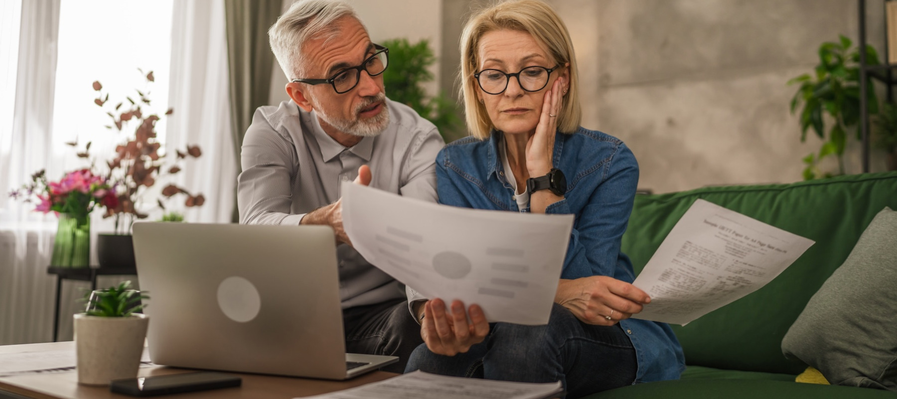 Older couple stressed about retirement.