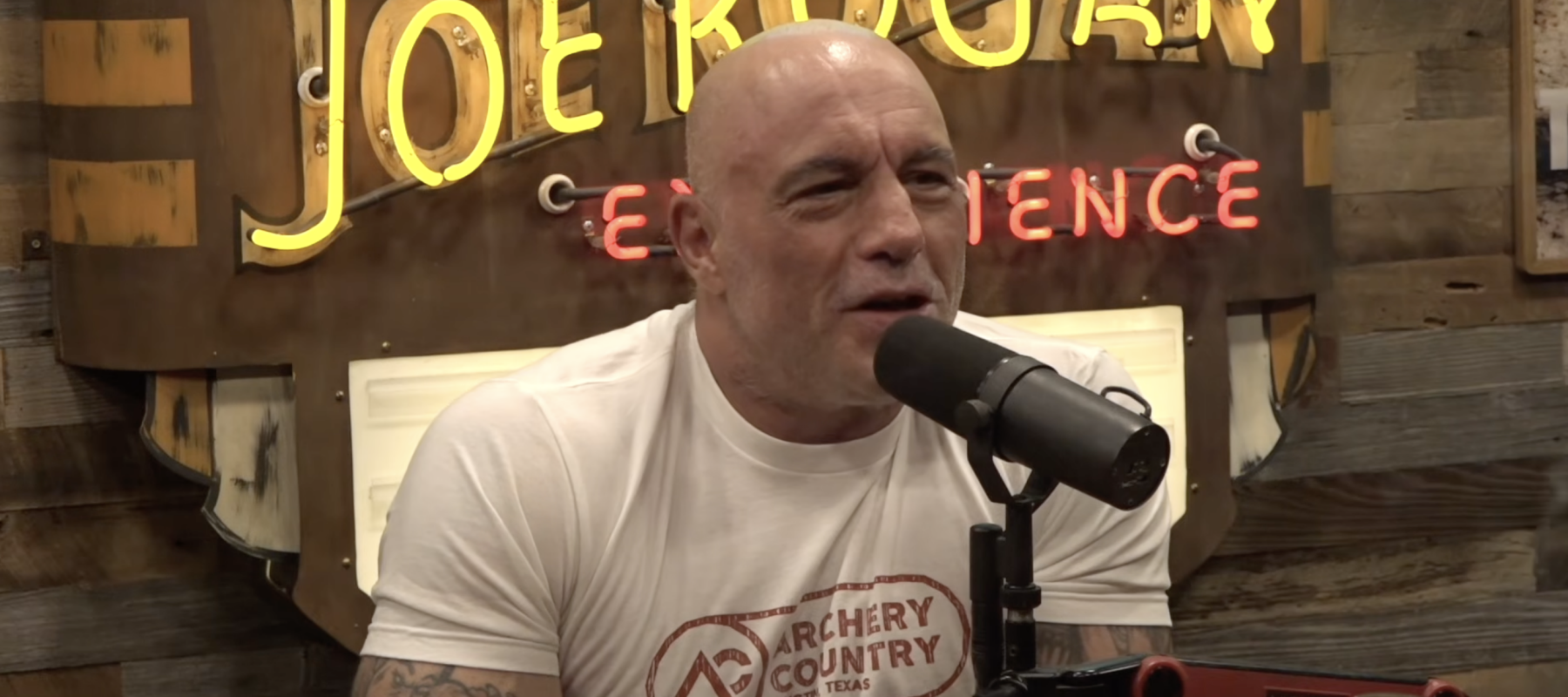 Joe Rogan hosting his podcast 'The Joe Rogan Experience.'