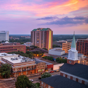 The downtown Tallahassee skyline at dusk.