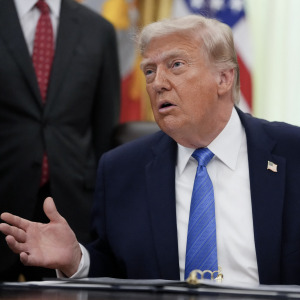 President Donald Trump speaks during a signing ceremony for the "Secure America Act" in the Oval Office of the White House.