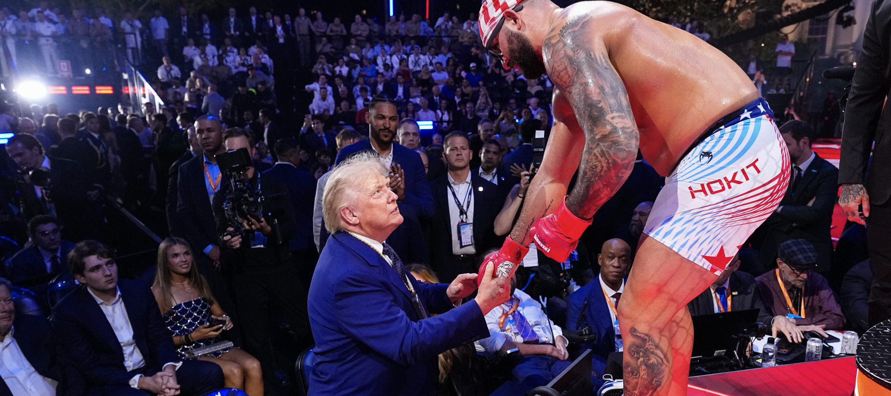 Josh Hokit speaks with U.S. President Donald J. Trump following his win in a heavyweight fight during the UFC Freedom 250 event on the South Lawn at the White House.