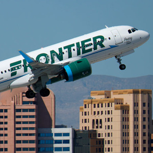 A Frontier Airlines Airbus A320 airplane departs from Harry Reid International Airport.