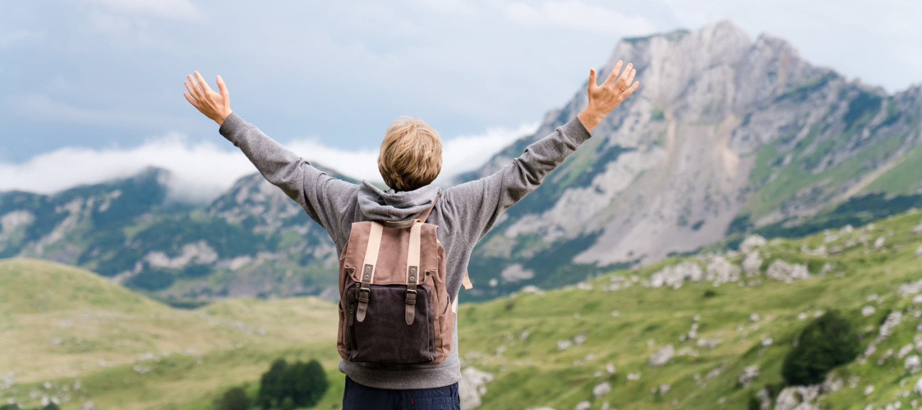 A photo of a man hiking