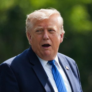 U.S. President Donald Trump departs after a Cabinet meeting at Camp David on July 31.