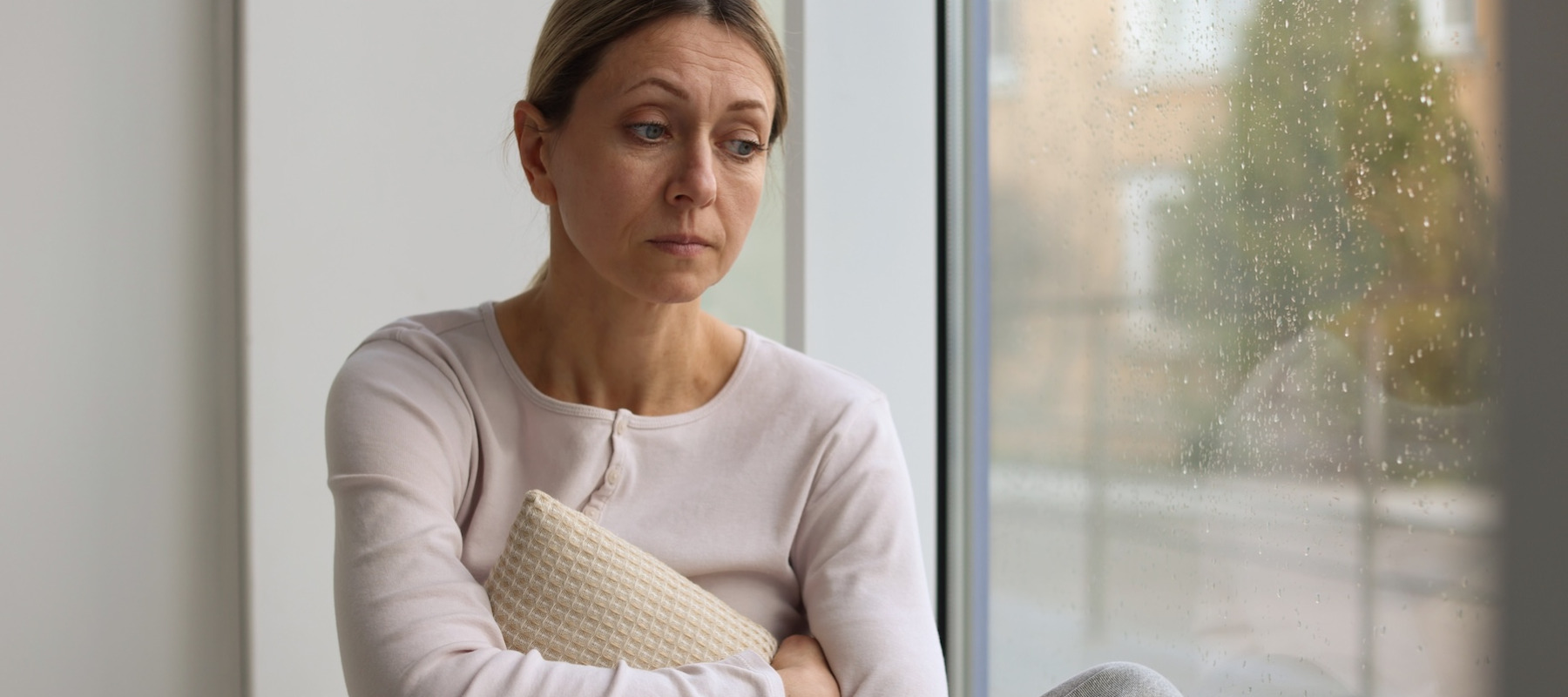 Worried middle aged woman.