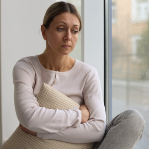 Worried middle aged woman.