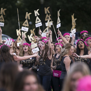 Members of Kappa Delta sorority chant as they welcome their new members.