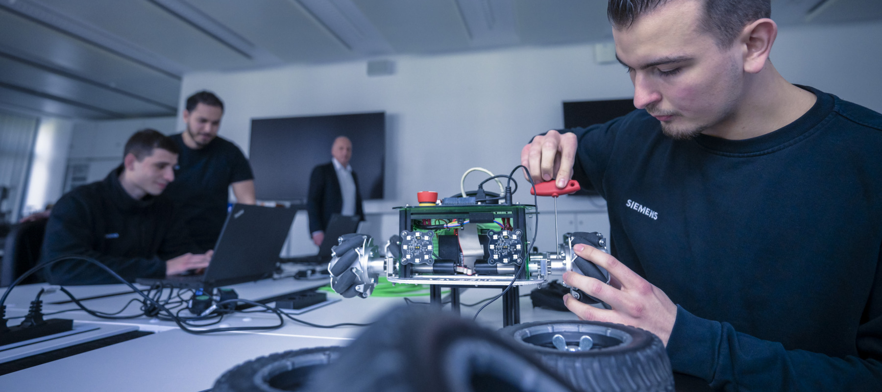 A student works on projects using artificial intelligence.