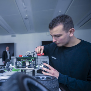 A student works on projects using artificial intelligence.