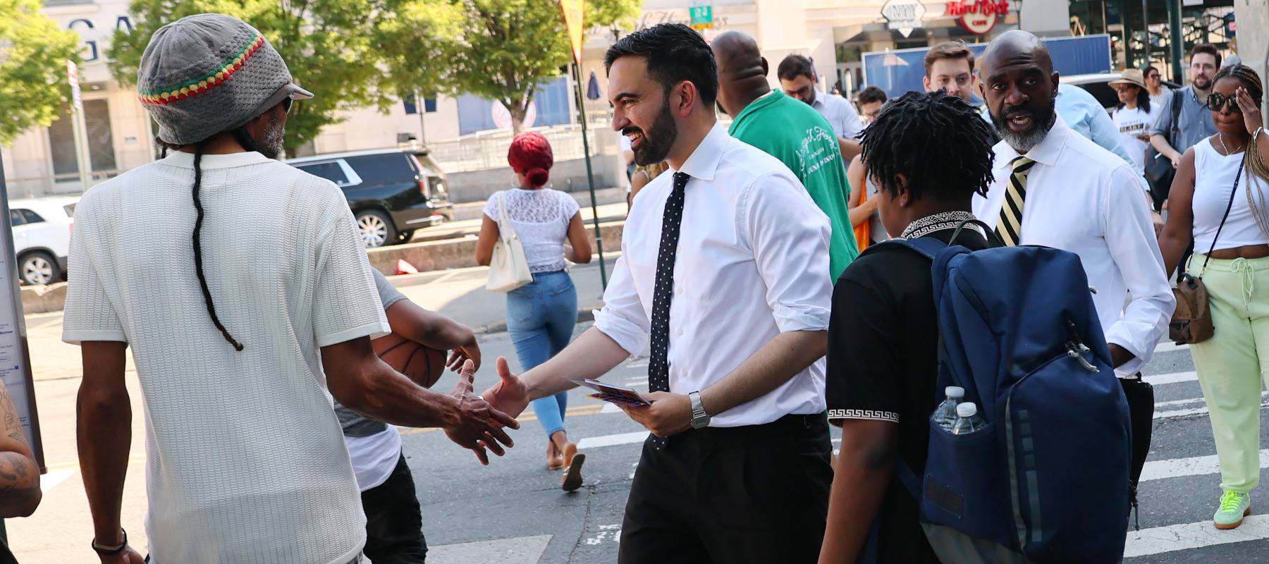Mayor Zohran Mamdani greets voters in New York City.