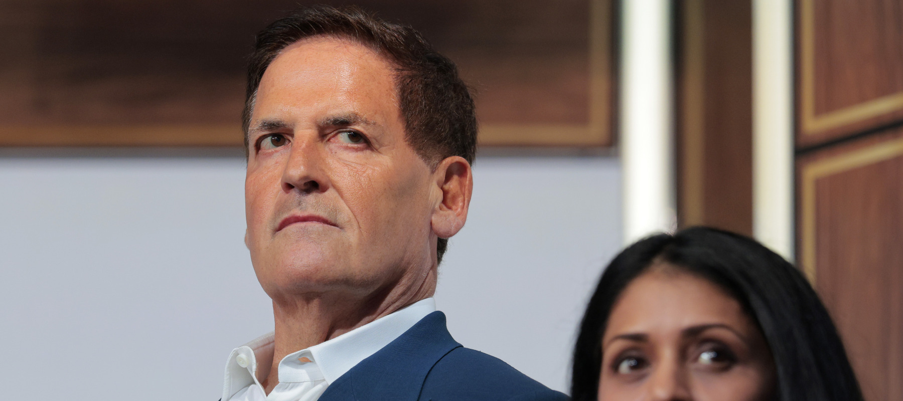 Entrepreneur and Cost Plus Drug Company (MCCPDC) Co-Founder Mark Cuban and Amazon Pharmacy Vice President and GM Tanvi Patel look on as President Trump speaks.