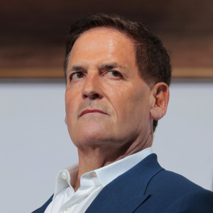 Entrepreneur and Cost Plus Drug Company (MCCPDC) Co-Founder Mark Cuban and Amazon Pharmacy Vice President and GM Tanvi Patel look on as President Trump speaks.