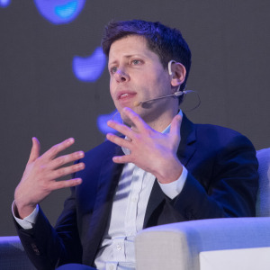OpenAI CEO Sam Altman speaks onstage at artificial intelligence conference.