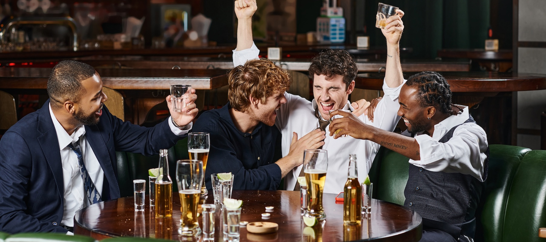 A group of friends partying during a bachelor party.