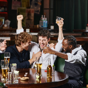 A group of friends partying during a bachelor party.