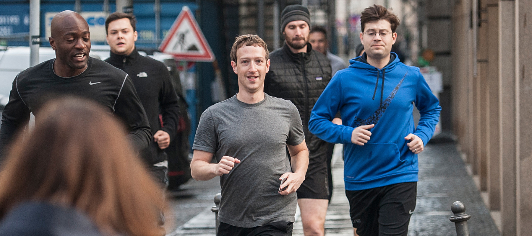 Mark Zuckerberg goes for a run with his bodyguards.
