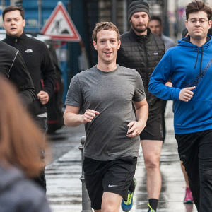 Mark Zuckerberg goes for a run with his bodyguards.