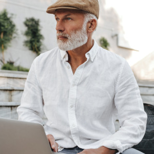 Man working on his laptop computer