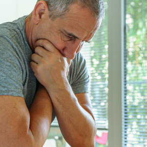 A man struggling with a decision