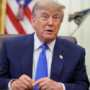 U.S. President Donald Trump speaks to reporters after signing an executive order requiring parents to make more doctor visits spaced out to receive childhood vaccines.