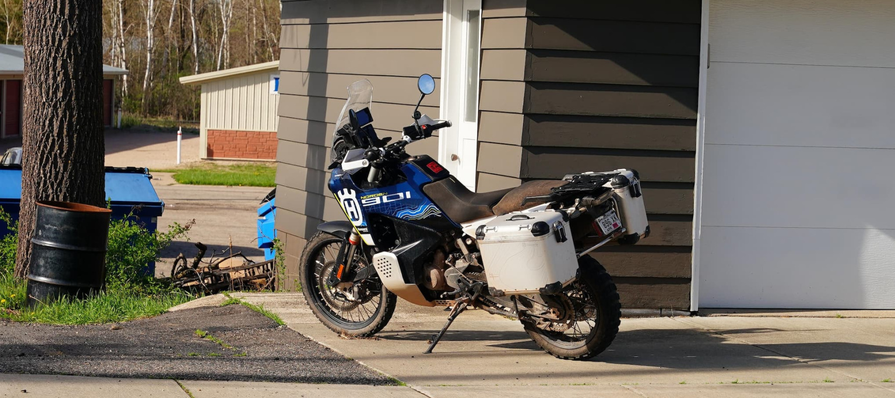 A photo of a motorcycle in a driveway