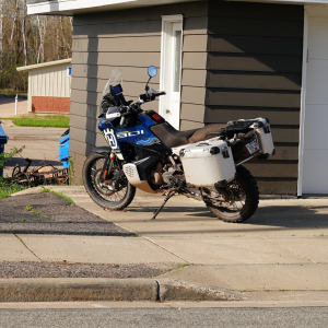A photo of a motorcycle in a driveway