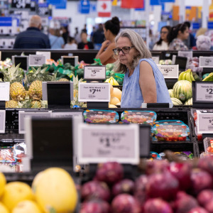 A customer shops at a Walmart store in Toronto, Canada
