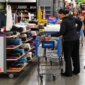 People shopping at Walmart.