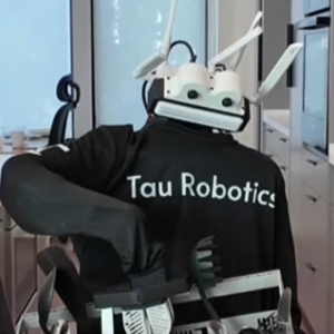 A humanoid robot from Tau Robotics demonstrates the cleaning tasks it can perform.